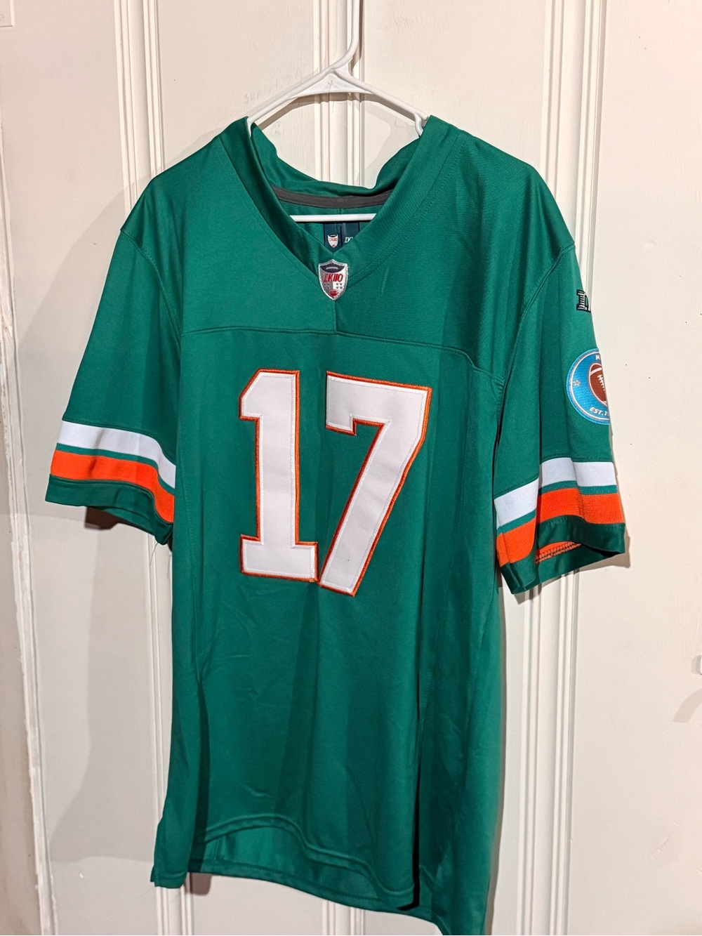 Green #17 Football Jersey with Orange & White Sleeve Stripes